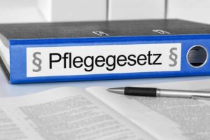 Ordner mit Pflegegesetzen