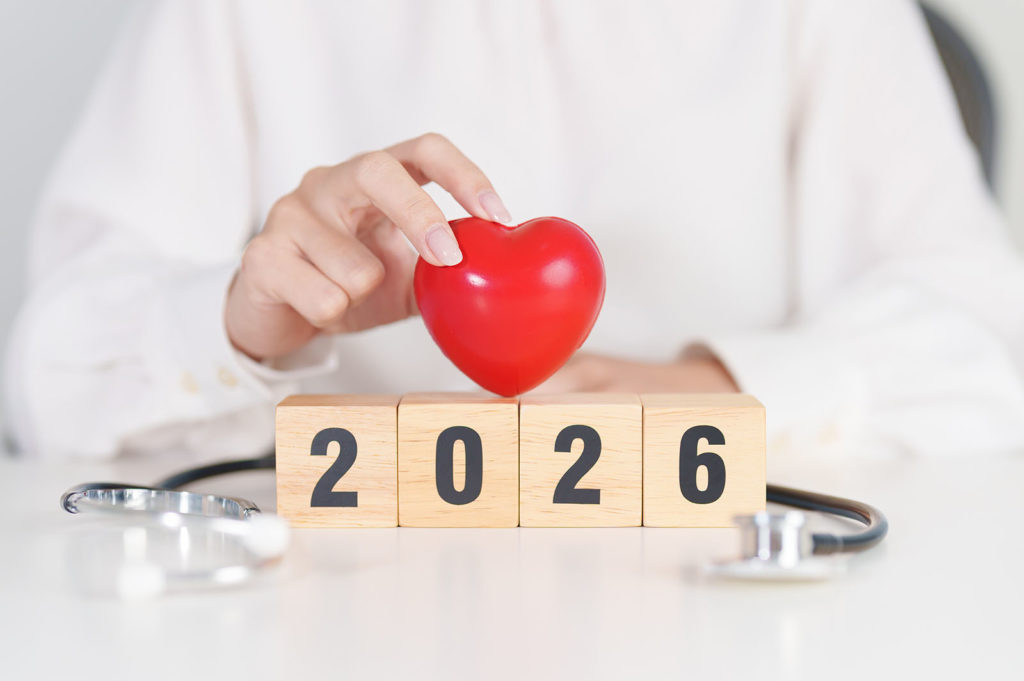 Arzt mit einem Herz in der Hand